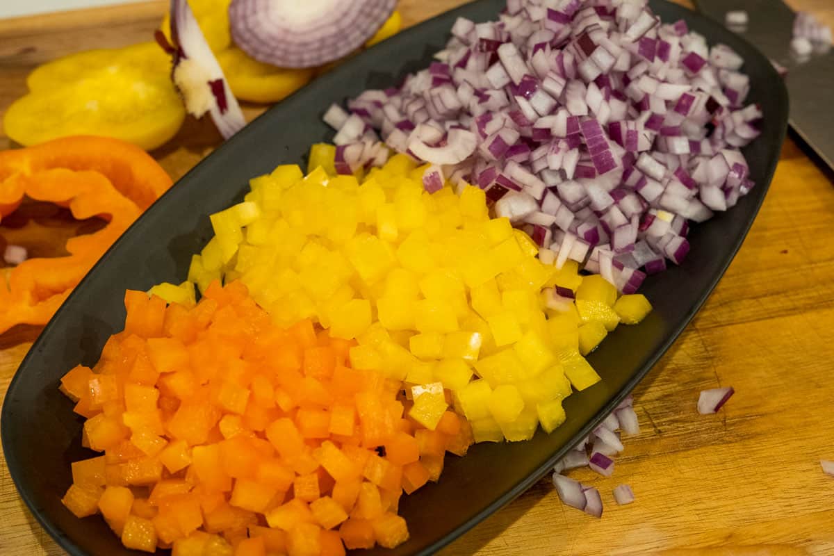 plate of small diced bell peppers and onions