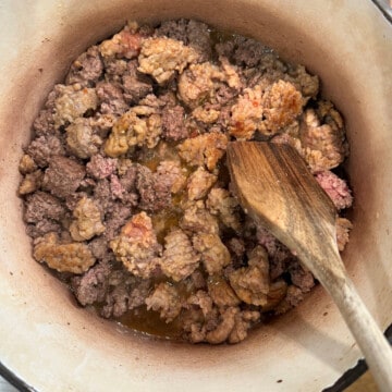 Browned meat in a dutch oven for chili.