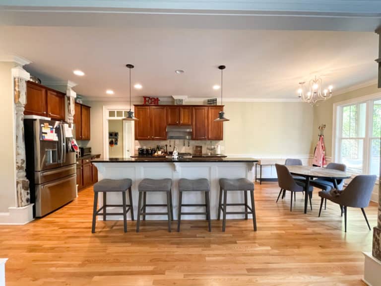 Kitchen with cherry cabinets and black granite