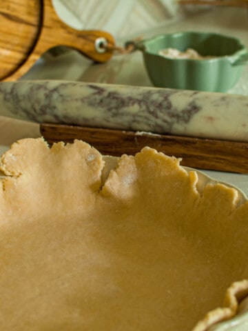 Pate Brisee Pie Crust in a dish with no pie filling