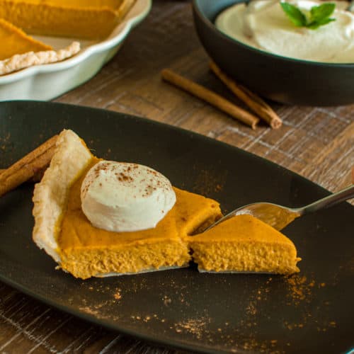 Sliced Pumpkin Pie with Fork