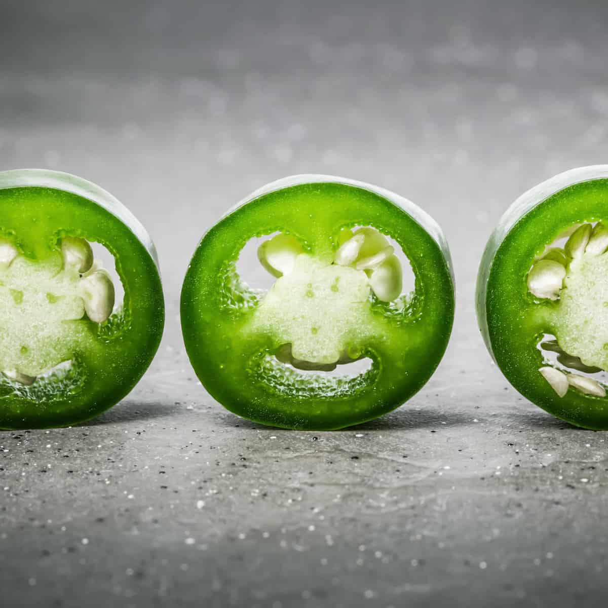 cross section view of a 3 slices of jalapenos