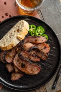 Smoked Brisket plated with Bread & Jalapenos