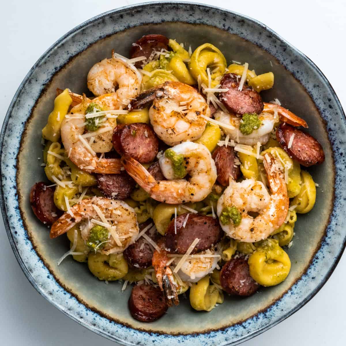 Shrimp & Andouille with tortellini served family style