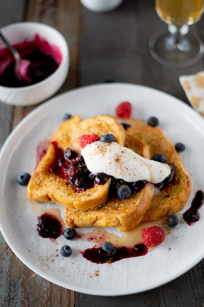 Brioche french toast with blueberry sauce and whipped cream