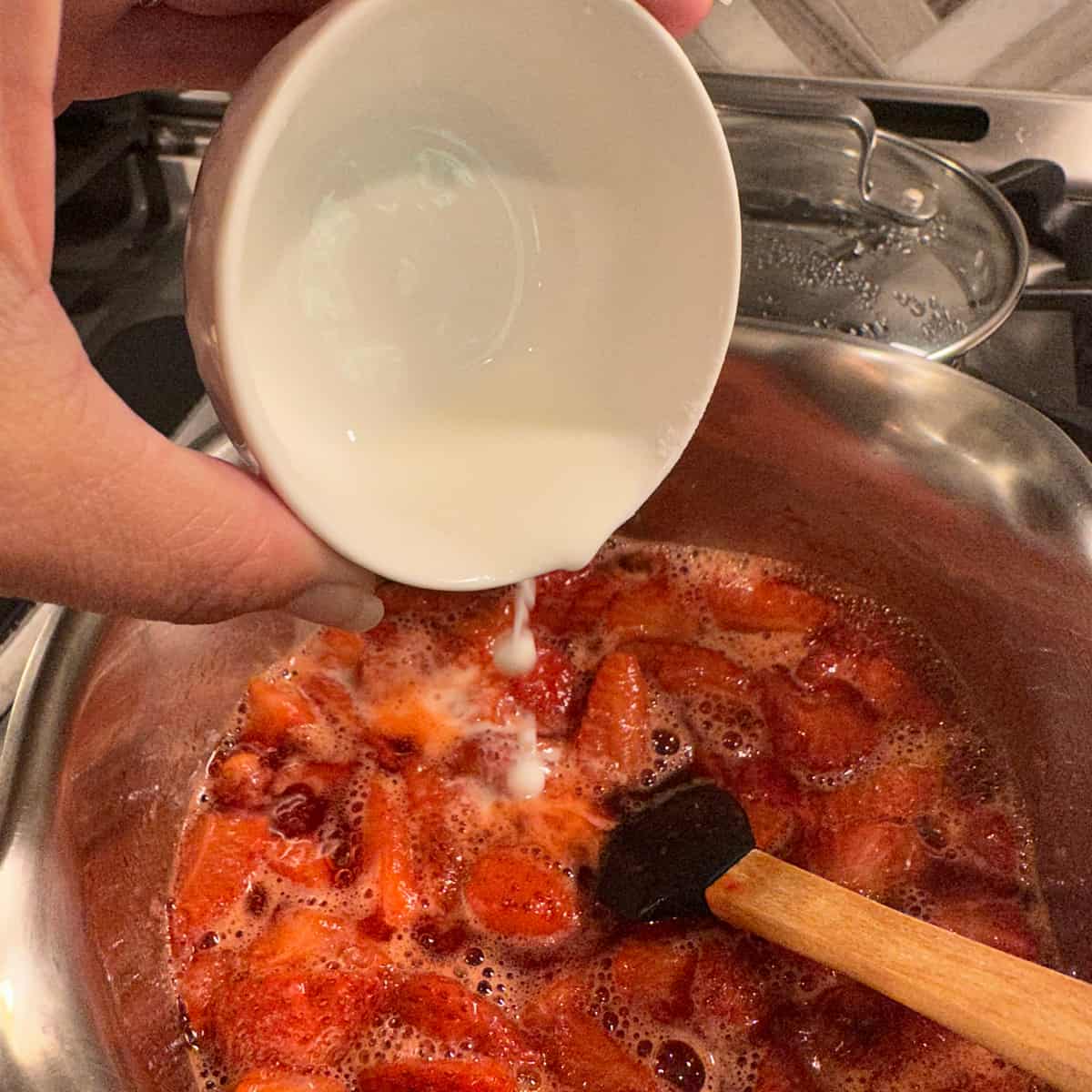 Adding Cornstarch with water to the finished product of Strawberry compote