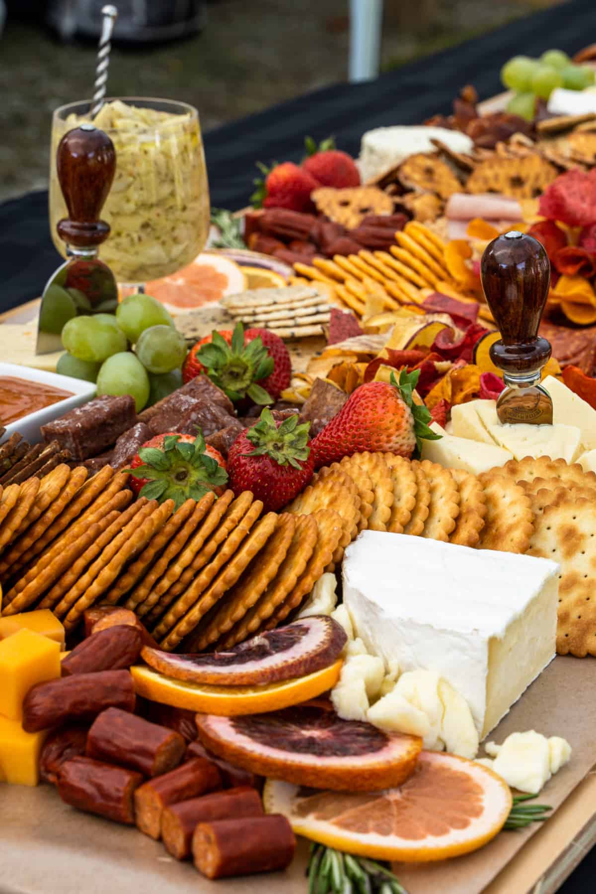A large table covered in charcuterie