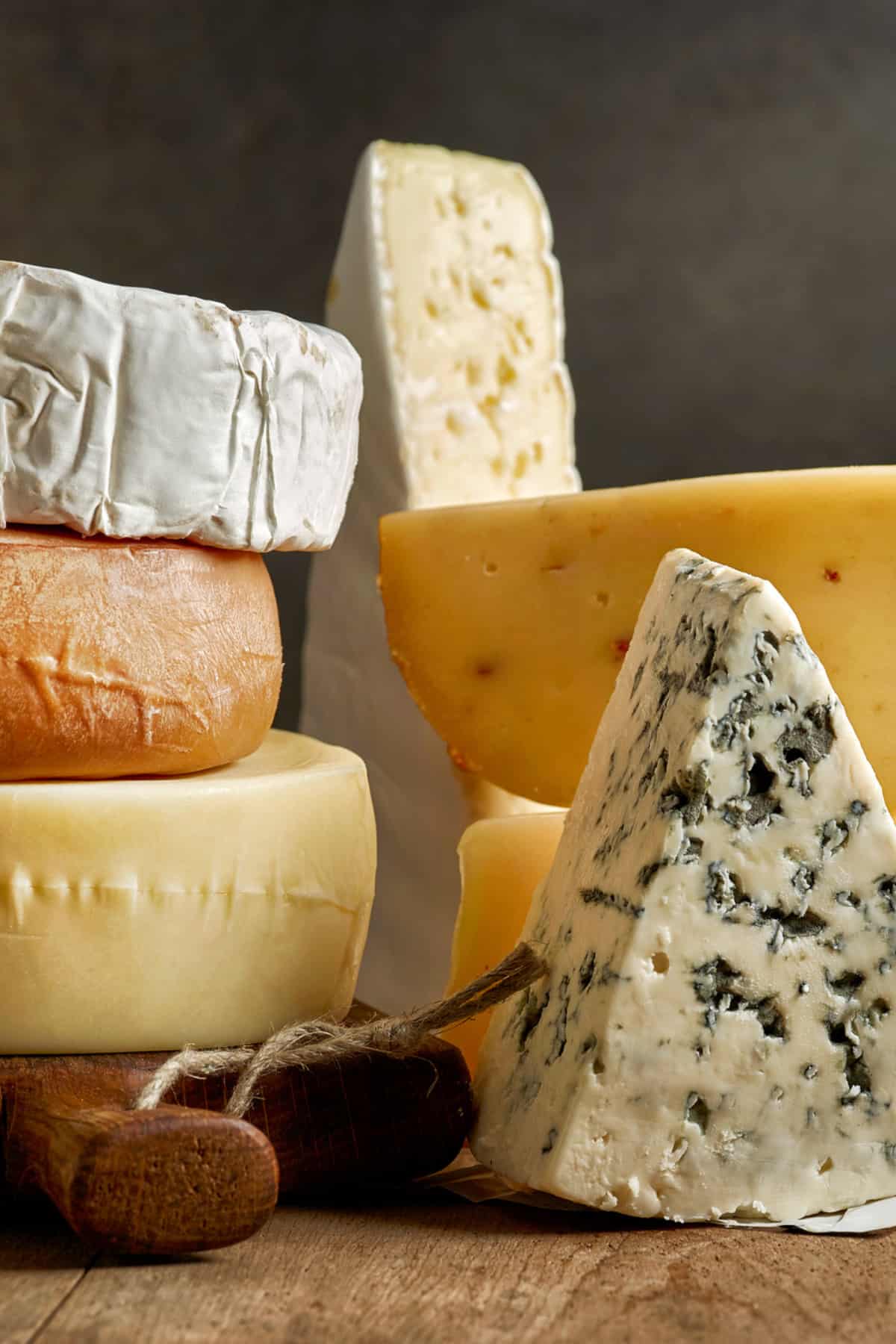 Stack of multiple cheese varieties