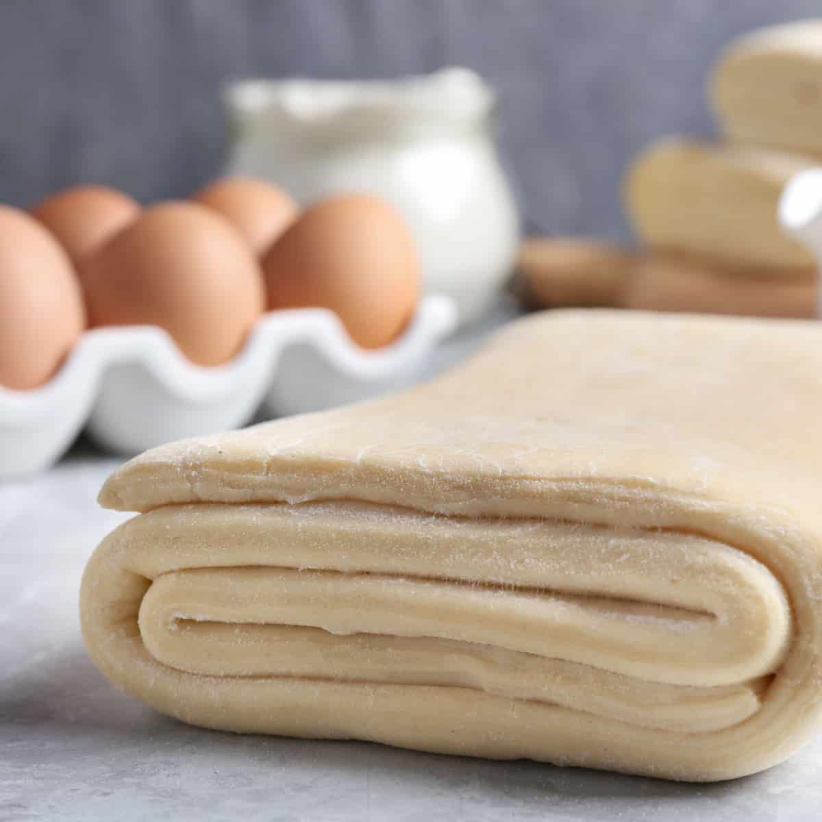 puff pastry dough, folded before rolled out to highlight layers of butter