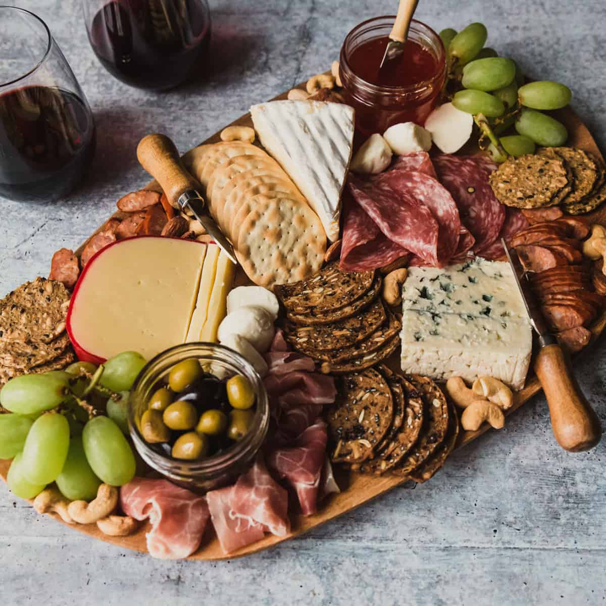 Wooden style serving tray as a charcuterie board
