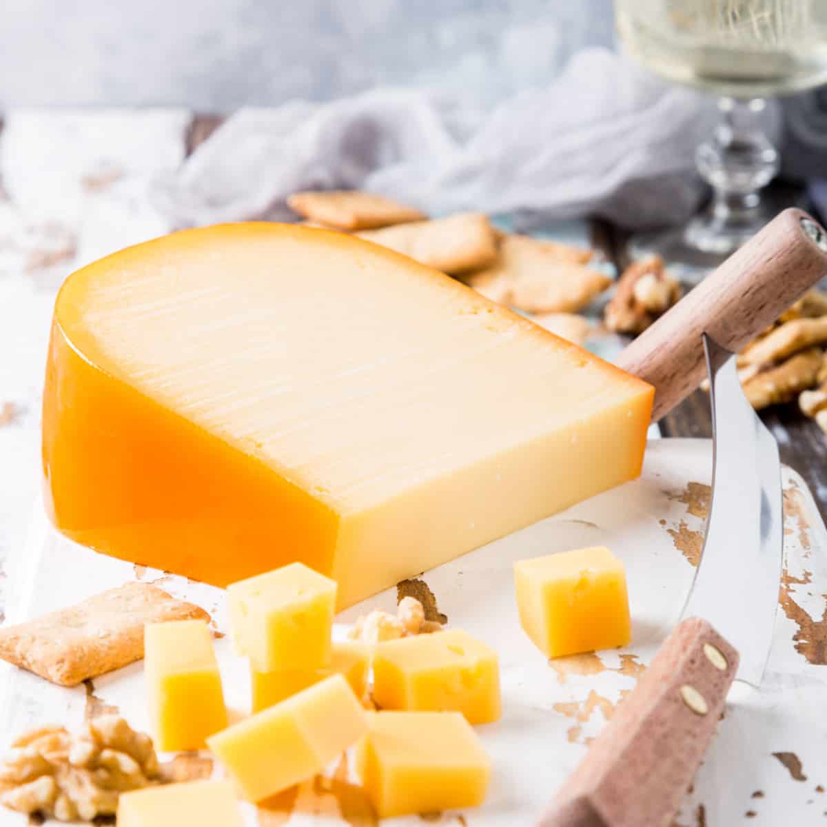 wedge of gouda cheese with cubes cut