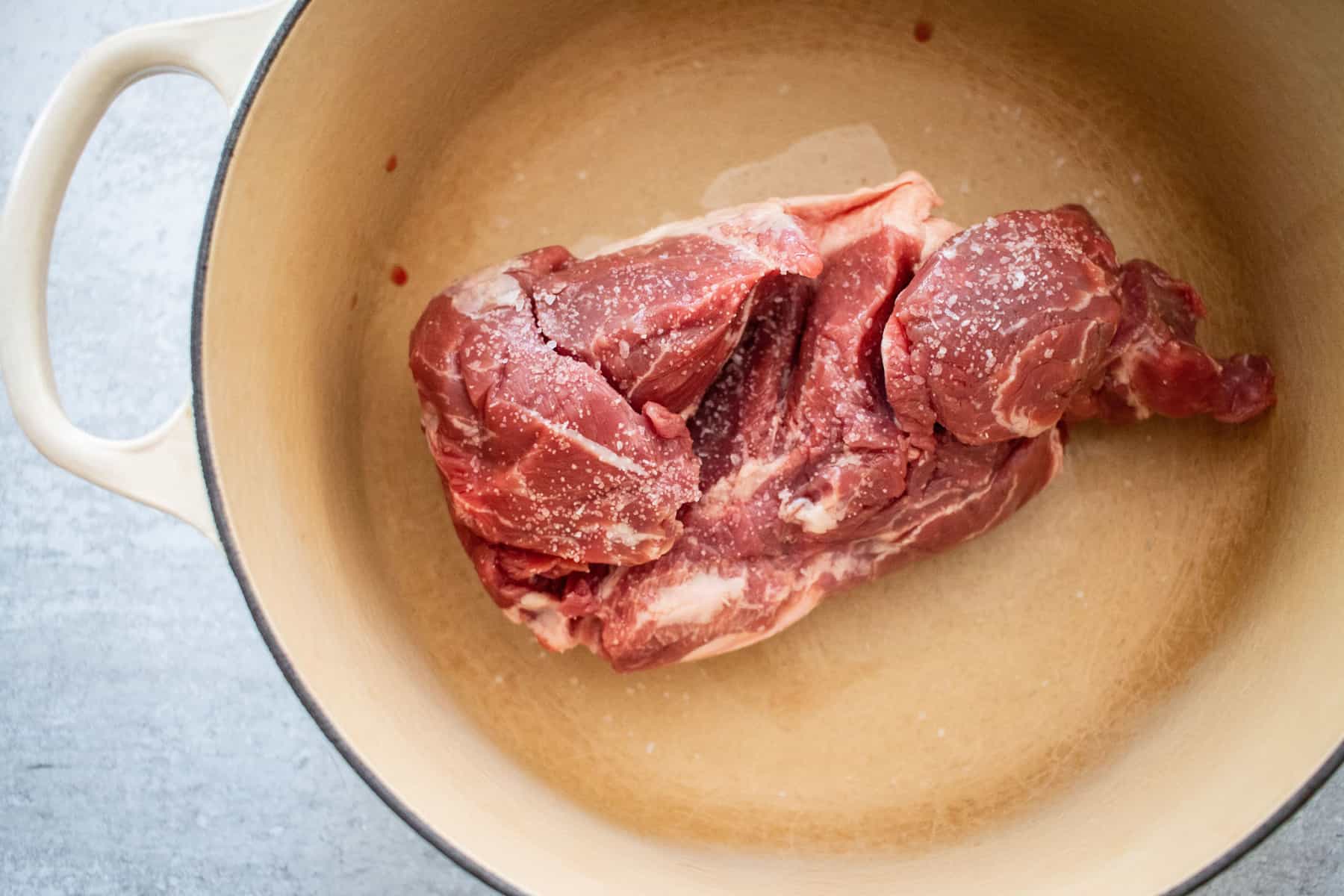 Beef roast searing in a dutch oven 