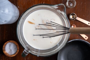 mixing the Mexican vanilla into the ice cream base