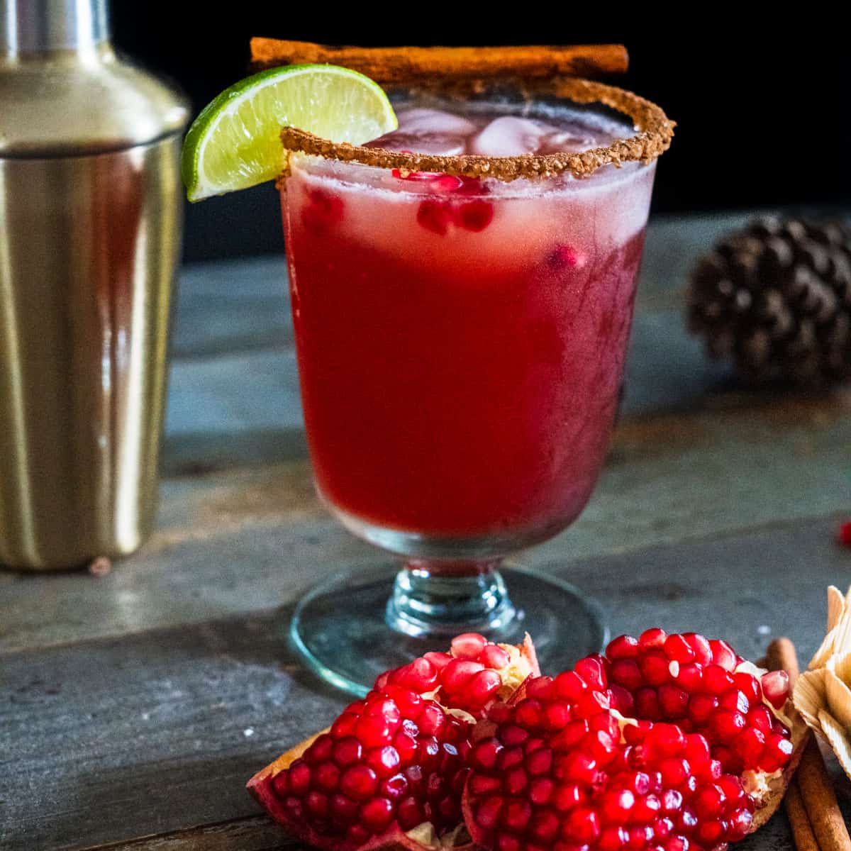 a Pomegranate Margarita with fresh Pomegranate on the table