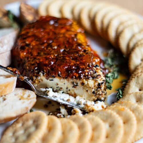 Hot pepper jelly over cream cheese with crackers